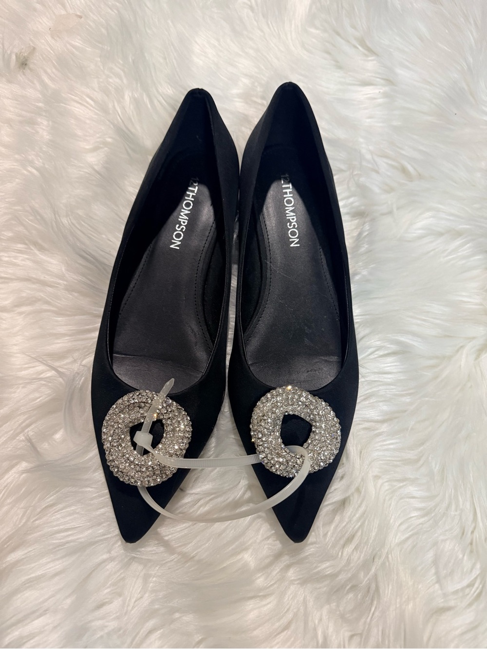 Thompson Black Pointed Toe Flats with Crystal Circle Accent